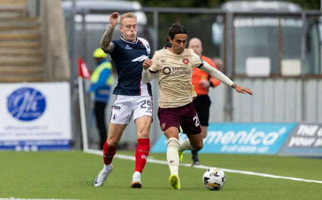 Falkirk's Calvin Miller and Hearts' Yan Dhanda