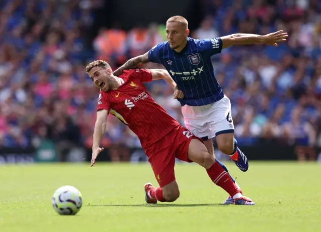 Woolfenden tackles Jota