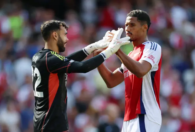 Raya and Saliba high five at full time