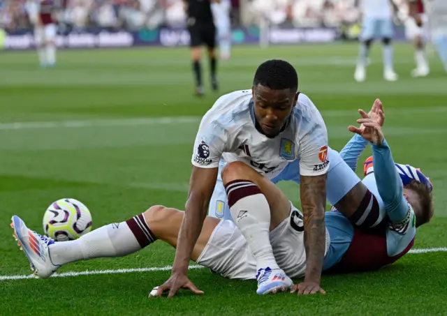 Bowen slides in to prevent Konsa guiding the ball out of play