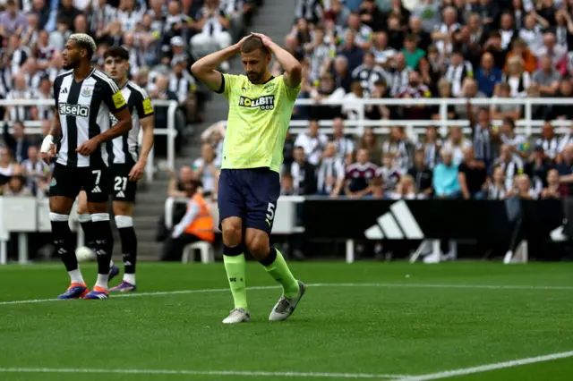 Stephens holds his hands to his head after a miss