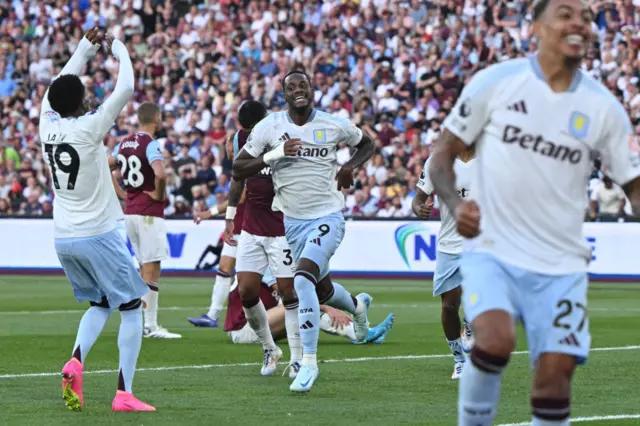 Duran smiles at a teammate as he runs off to celebrate his goal