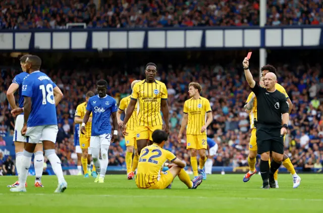 Young walks away as he is shown a red card