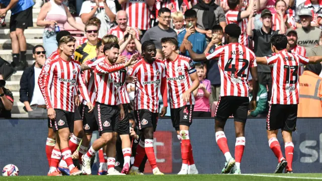 Sunderland players celebrate beating Sheffield Wednesday