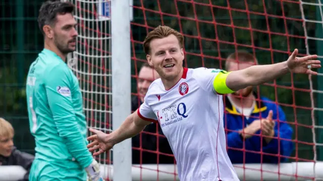 Spartans striker Blair Henderson celebrates