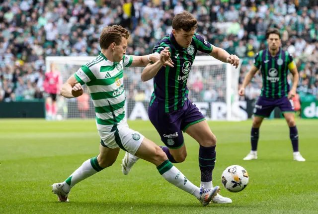 Hibernian's Josh Campbell and Celtic's Alistair Johnston in action during a Premier Sports Cup last sixteen match between Celtic and Hibernian at Celtic Park