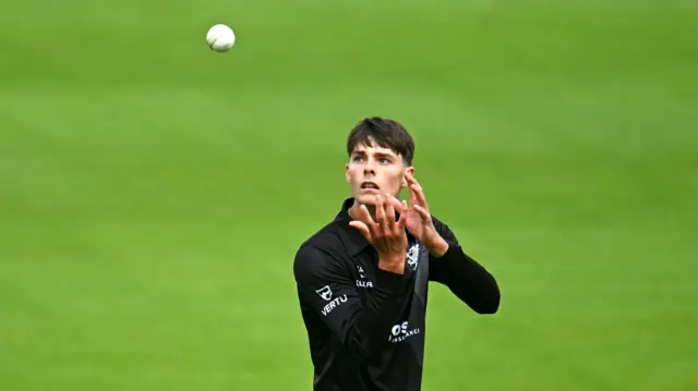 Somerset youngster Archie Vaughan has a safe pair of hands - like his dad