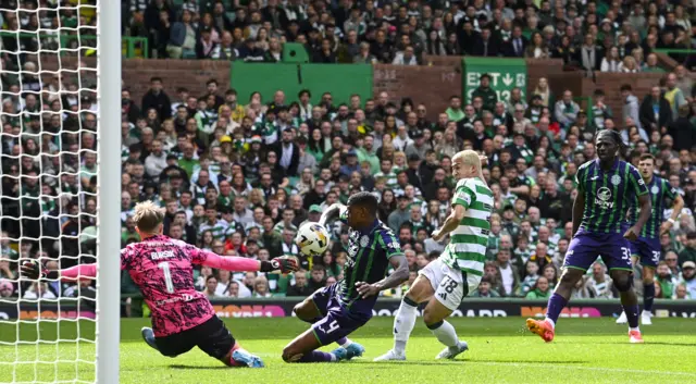 Celtic's Daizen Maeda scores to make it 1-0 during a Premier Sports Cup last sixteen match between Celtic and Hibernian at Celtic Park