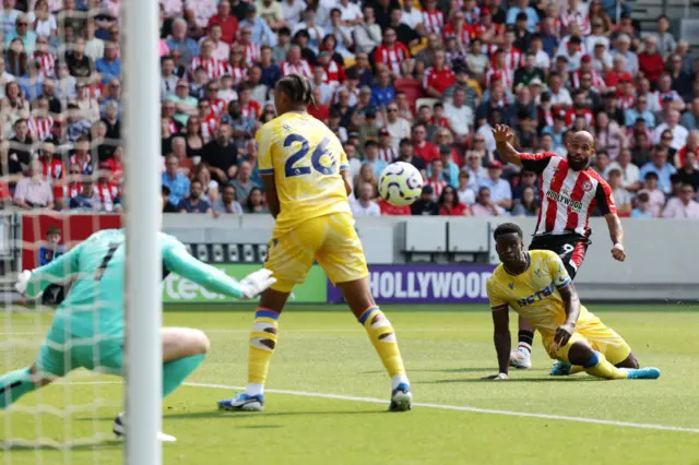 Bryan Mbeumo's shot going into the bottom corner of the Crystal Palace goal