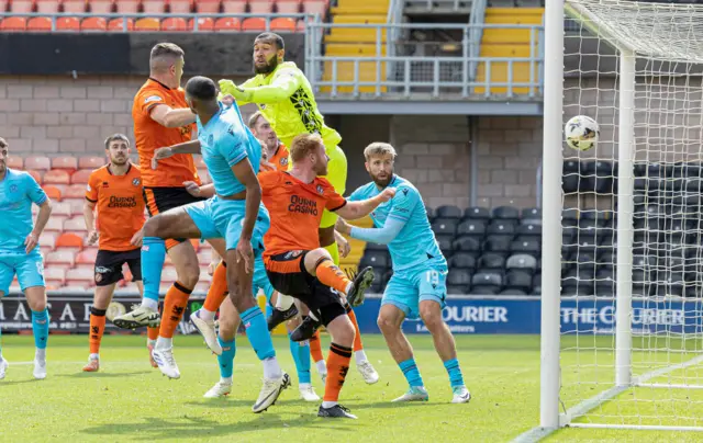 Dundee United's Ross Graham scores