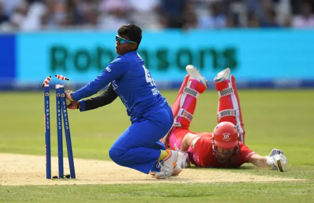 Jess Jonassen of Welsh Fire makes her ground as Deepti Sharma of London Spirit removes the bails during The Hundred Final