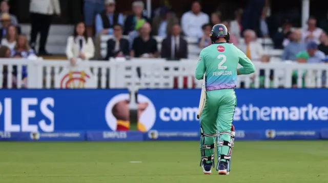 Oval Invincibles' Donovan Ferreira leaves the field after being caught out by Southern Brave's Kieron Pollard