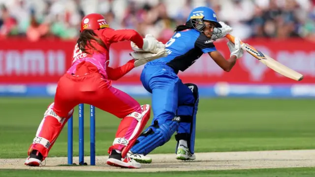 Griffith is caught out by Bryce behind the stumps