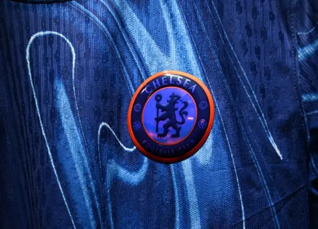 Chelsea badge on the shirt