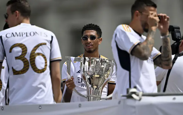 Jude Bellingham holding the La Liga trophy