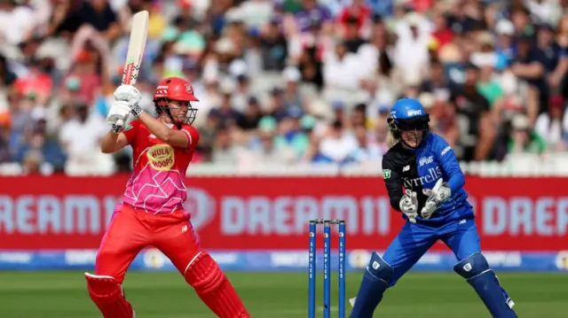 Jess Jonassen of Welsh Fire hits the ball through the off-side during The Hundred Final match