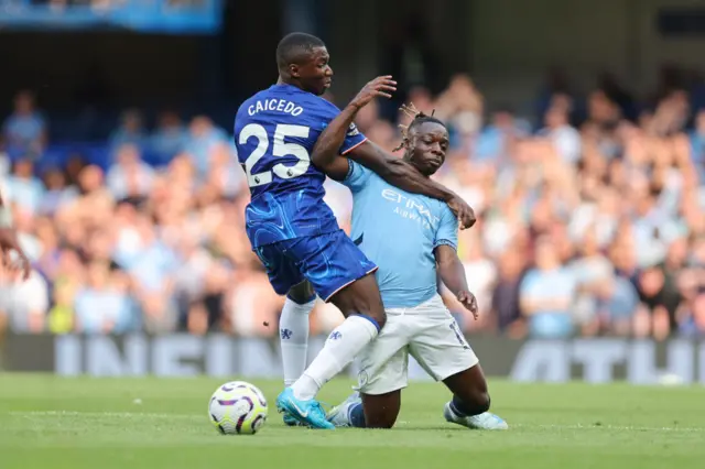 Moises Caicedo and Jeremy Doku