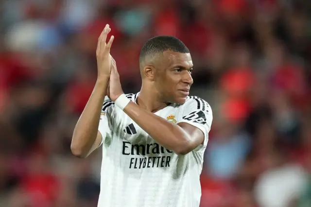 Kylian Mbappe of Real Madrid applauds the fans