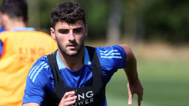 Tom Cannon runs during training with Leicester