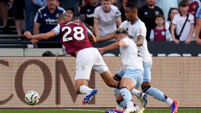 Matty Cash fouls Tomas Soucek for a West Ham penalty