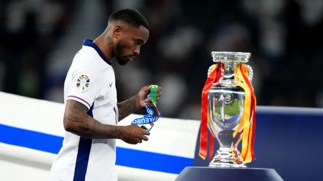 Ivan Toney walks past the European Championship trophy after England lose the Euro 2024 final