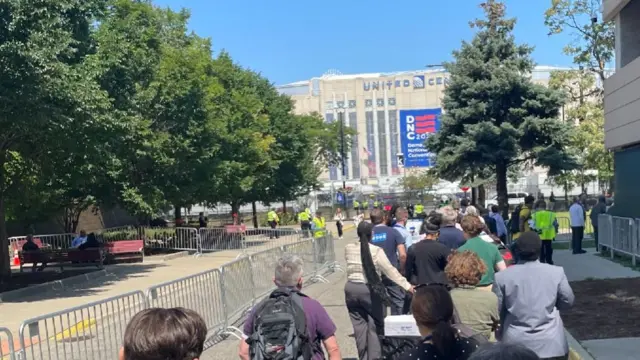 People queue outside  United Center in Chicago