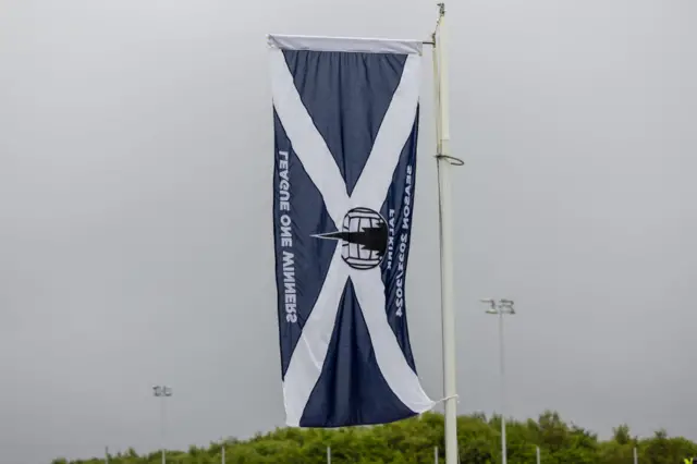 The League One winners flag is unfurled before a William Hill Championship match between Falkirk and Queen's Park at the Falkirk Stadium, on August 02, 2024, in Falkirk, Scotland. (Photo by Mark Scates / SNS Group)