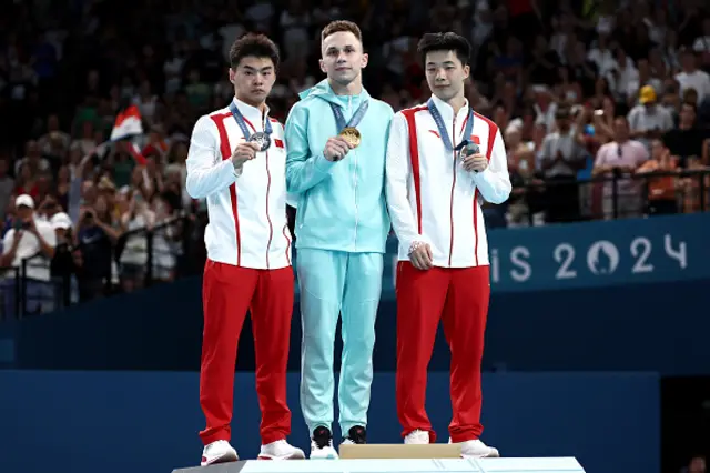 Ivan Litvinovich poses on the podium