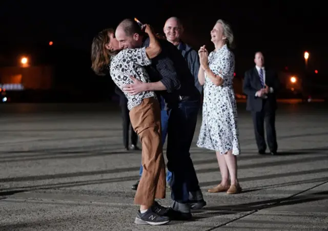 Evan Gershkovic hugs his mother Ella Milman