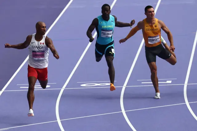 Canada's Damian Warner wins his 100m heat in decathlon at 2024 Paris Olympics