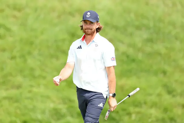 Tommy Fleetwood of Team Great Britain reacts