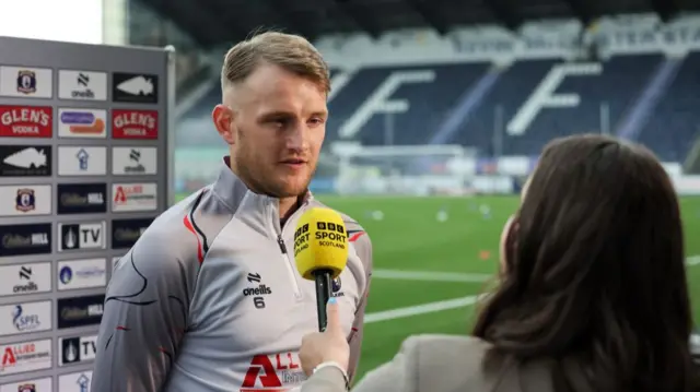 Falkirk's Coll Donaldson speaks to the BBC before a William Hill Championship match between Falkirk and Queen's Park at the Falkirk Stadium, on August 02, 2024, in Falkirk, Scotland. (Photo by Mark Scates / SNS Group)