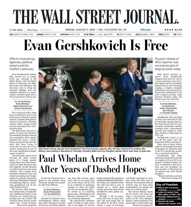 A screenshot of the Wall Street Journal's front page story, which reads "Evan Gershkovich is free" with a photo of the reporter hugging his mother.