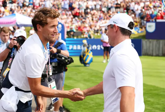 Casper Ruud greets Rory McIlroy of Team Ireland