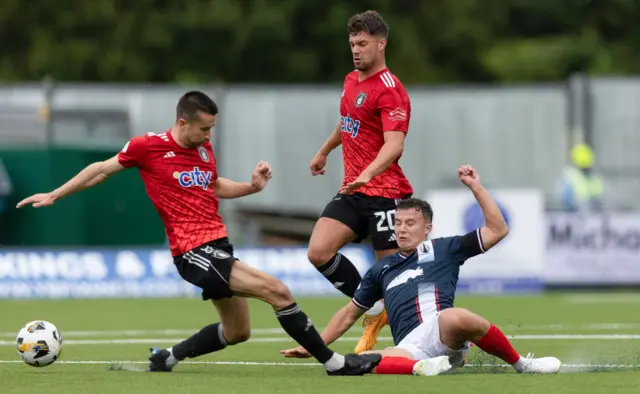 Falkirk's Dylan Tait (R) and Queen's Park's Cammy Kerr in action during a William Hill Championship match between Falkirk and Queen's Park at the Falkirk Stadium, on August 02, 2024, in Falkirk, Scotland. (Photo by Mark Scates / SNS Group)