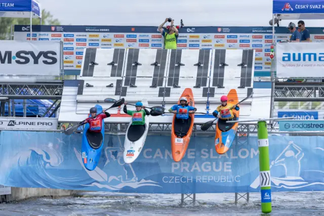 (L-R) Kimberley Woods of Great Britain, Romane Prigent of France, Shikha Chouhan of India and Marcella Altman of the United States compete in the Women's Kayak Cross Heats during the 2024 ICF Canoe Slalom World Cup