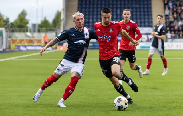 Queen's Park's Cammy Kerr (R) and Falkirk's Callumn Morrison in action during a William Hill Championship match between Falkirk and Queen's Park at the Falkirk Stadium, on August 02, 2024, in Falkirk, Scotland. (Photo by Mark Scates / SNS Group)