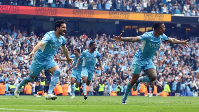 Ilkay Gundogan celebrates scoring for Manchester City against Aston Villa