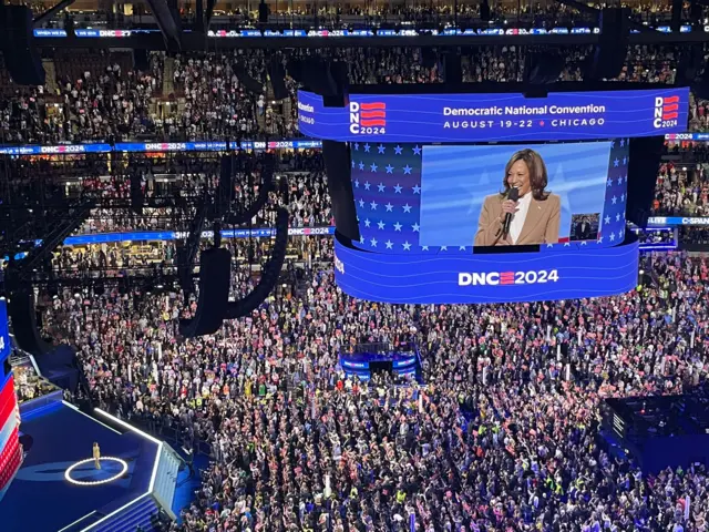 Kamala Harris walks out on stage at the DNC