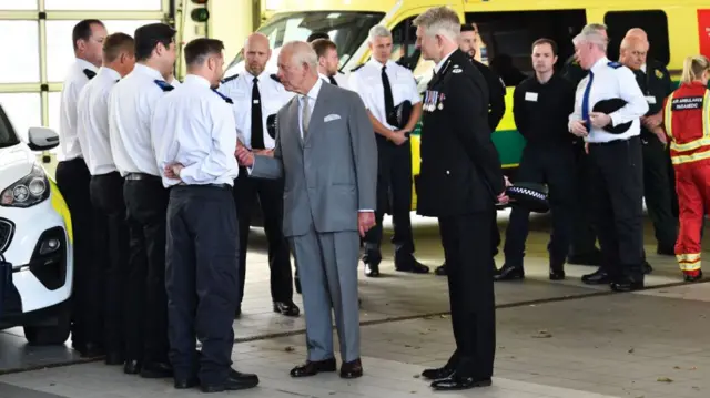 Britain's King Charles III meets with representatives from Merseyside's emergency services and local community groups