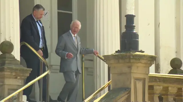 Charles leaves town hall