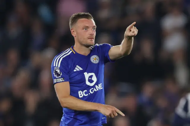 Jamie Vardy points at the crowd