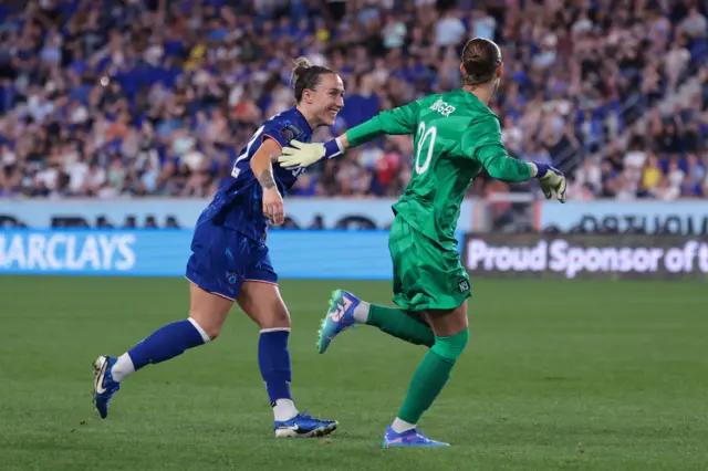 Lucy Bronze and Ann-Katrin Berger joke around