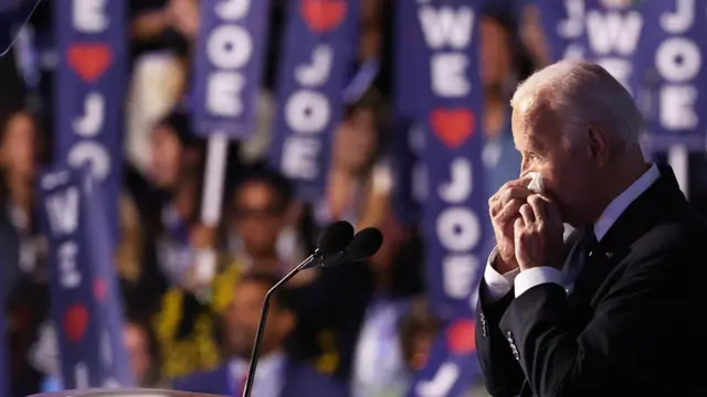 Biden wipes away a tear