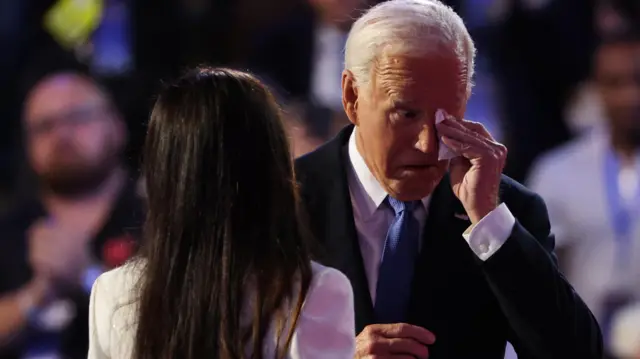 U.S. President Joe Biden reacts as he joins his daughter Ashley onstage during Day one of the Democratic National Convention (DNC) in Chicago, Illinois, U.S., August 19, 2024. REUTERS/Brendan Mcdermid