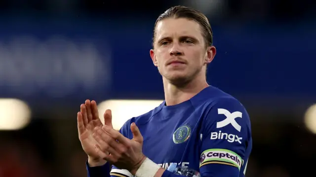 Conor Gallagher applauds the Chelsea fans