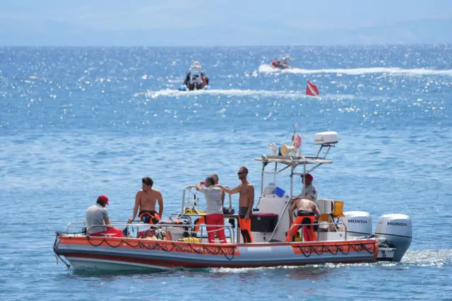 Rescue divers on a boat