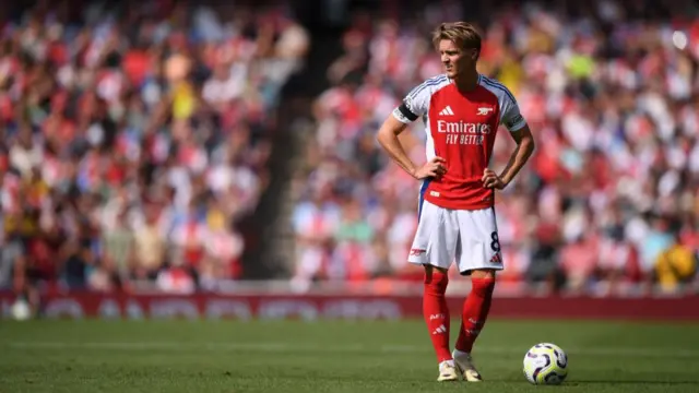 Martin Odegaard of Arsenal looks on during the Premier League match between Arsenal FC and Wolverhampton Wanderers FC at Emirates Stadium on August 17, 2024 in London, England.