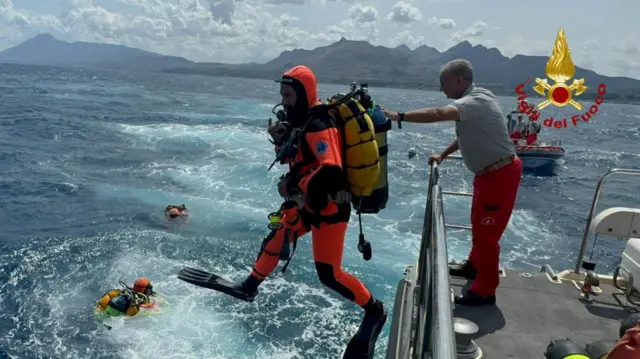 A diver jumping from a boat