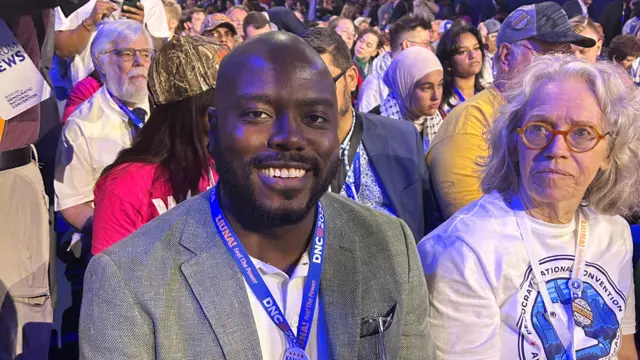 Funlola Otukoya sits with the Minnesota delegation on the DNC floor